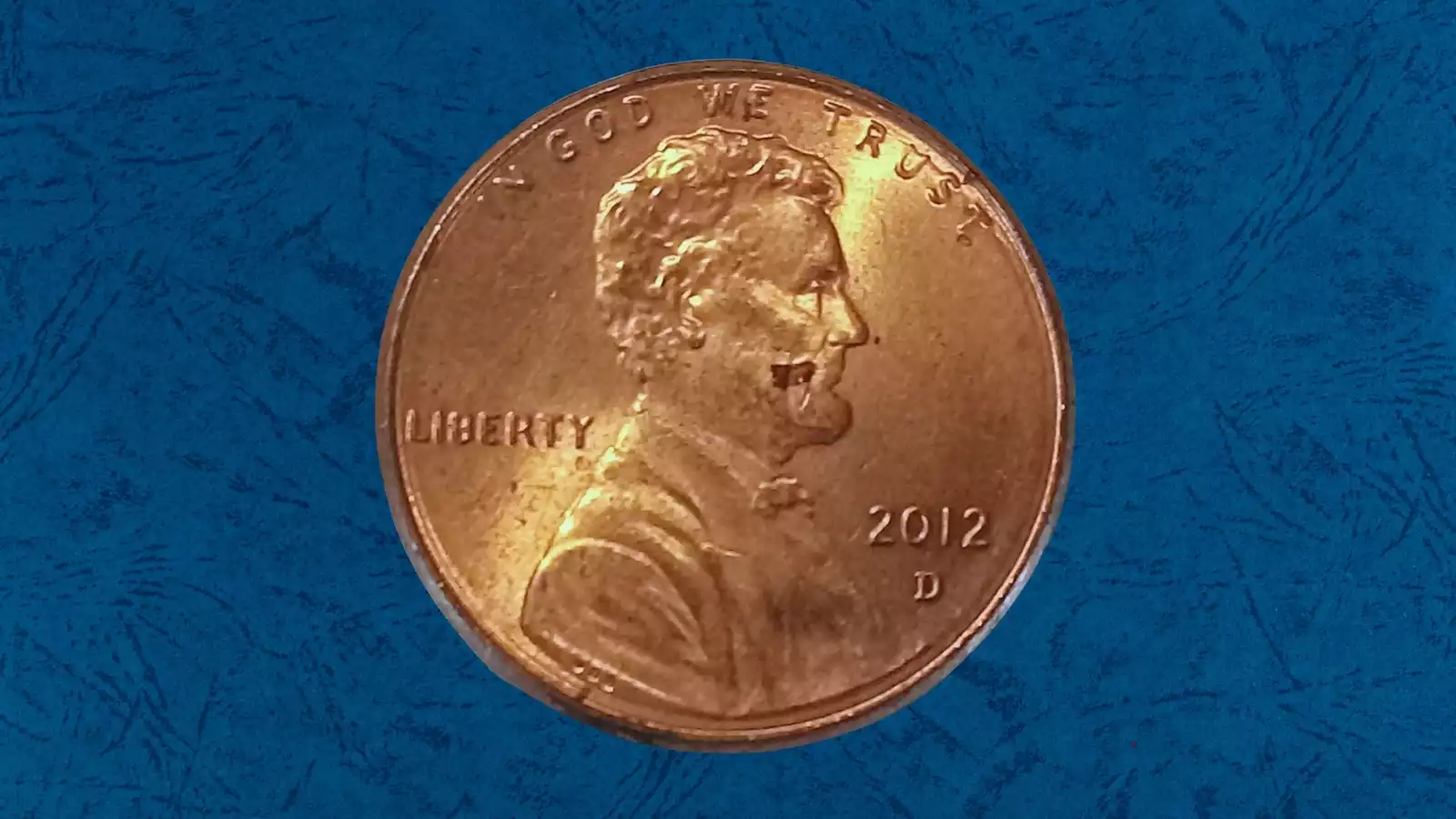 2012 penny broadstrike error showing wider-than-normal diameter and flat plain edge
