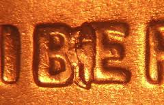2012 penny BIE error showing die chip between B and E in LIBERTY creating a spurious I shape